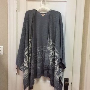 Gray and white poncho